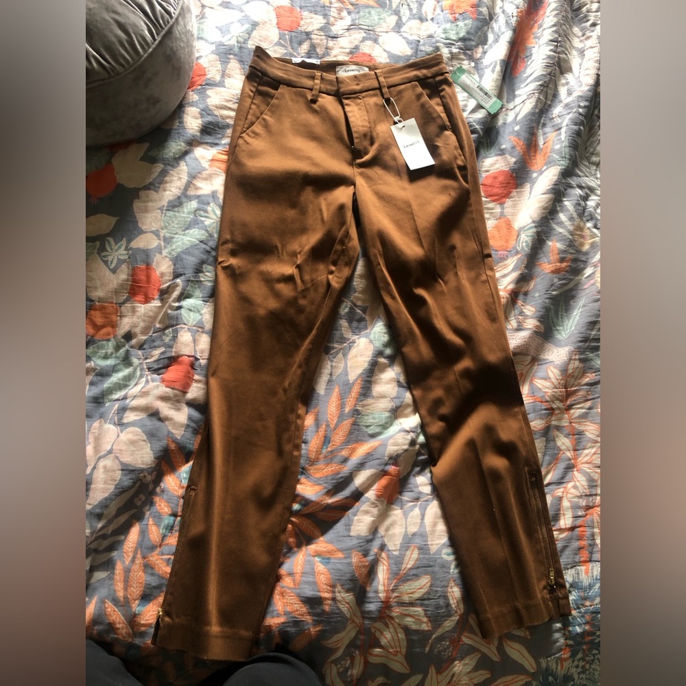Level 99 women’s pants in copper. Size 27